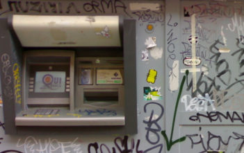 Graffiti-covvered ATM cash machine