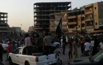 Militants celebrate in Raqqa after Islamic State declared