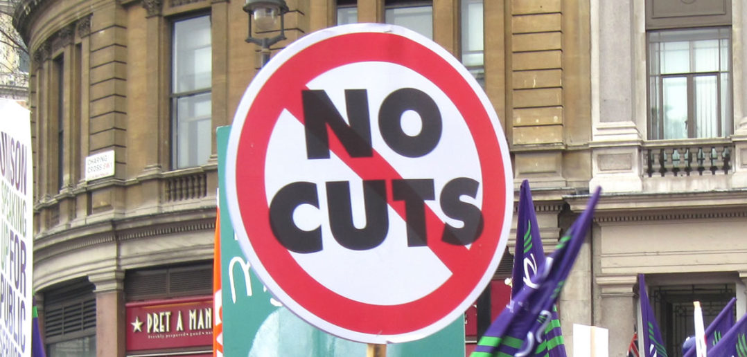 "No Cuts" strike placard