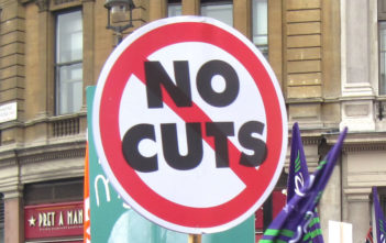 "No Cuts" strike placard