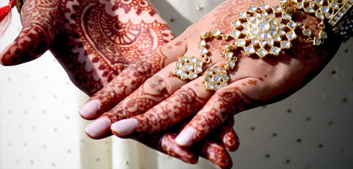 Indian wedding with mehndi on hands