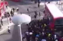 Bus lifted off cyclist