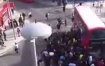 Bus lifted off cyclist