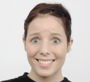 Happy face with fearful eyes