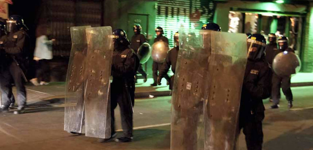 Riot police in Brixton, London